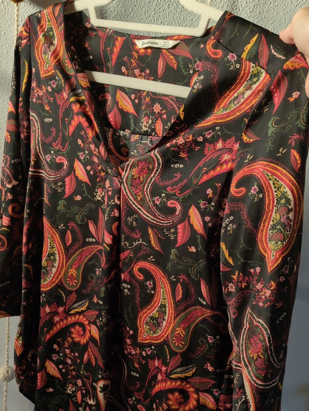 Black Paisley V-Neck Blouse with Coral and Gold Accents